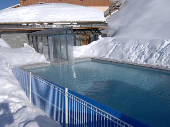 Appartement à la montagne au pied des pistes avec piscine chauffée