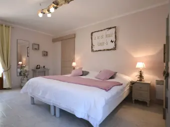 Chambre en bord de mer avec cuisine d'été à partager