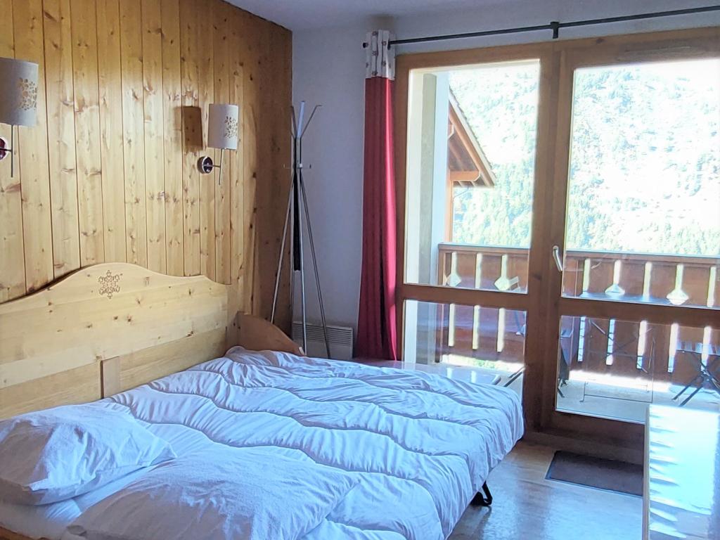 Appartement à la montagne au pied des pistes avec piscine chauffée