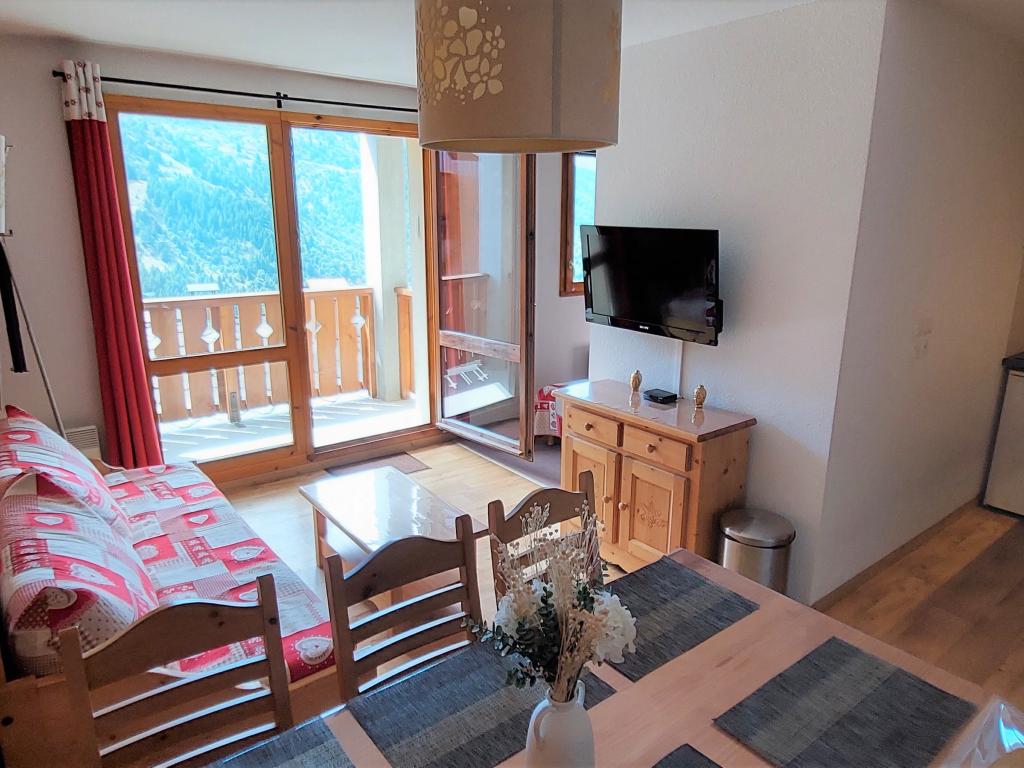 Appartement à la montagne au pied des pistes avec piscine chauffée