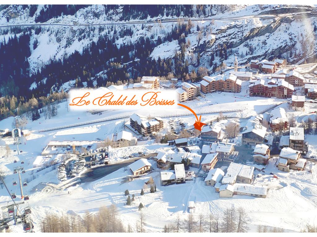 Le Chalet des Boisses, Ski aux pieds -Tignes 1800 -  10/14 personnes - 4 étoiles,  5ch, 5 pièces d'eau,  jacuzzi, hammam, coin feu... au bord des pistes avec vue sur le front de neige