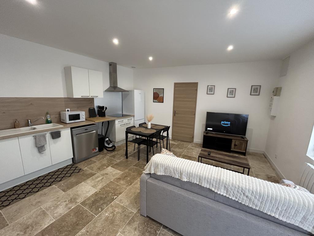 T2 rez de jardin parking et terrasse privé