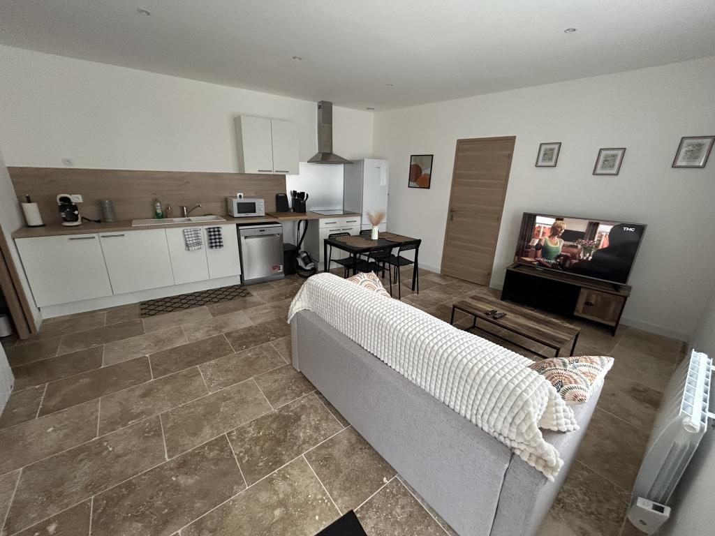 T2 rez de jardin parking et terrasse privé