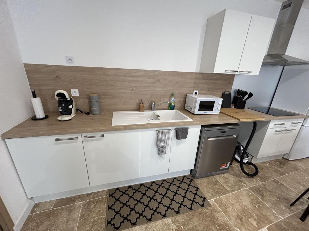 T2 rez de jardin parking et terrasse privé