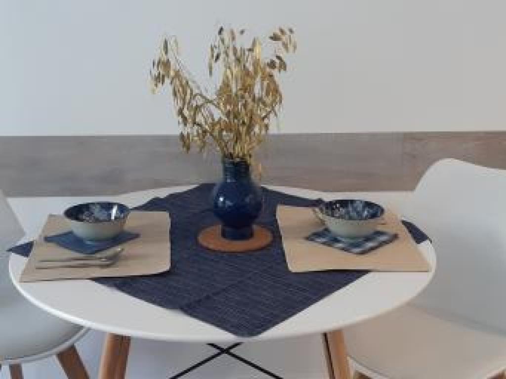 Appartement en rez-de-jardin avec terrasse