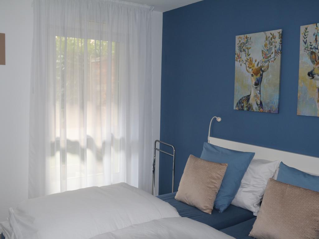 Appartement en rez-de-jardin avec terrasse
