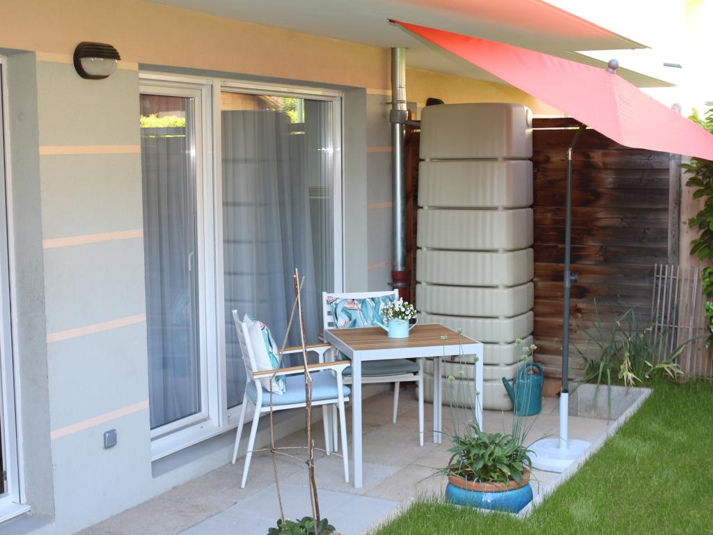 Appartement en rez-de-jardin avec terrasse